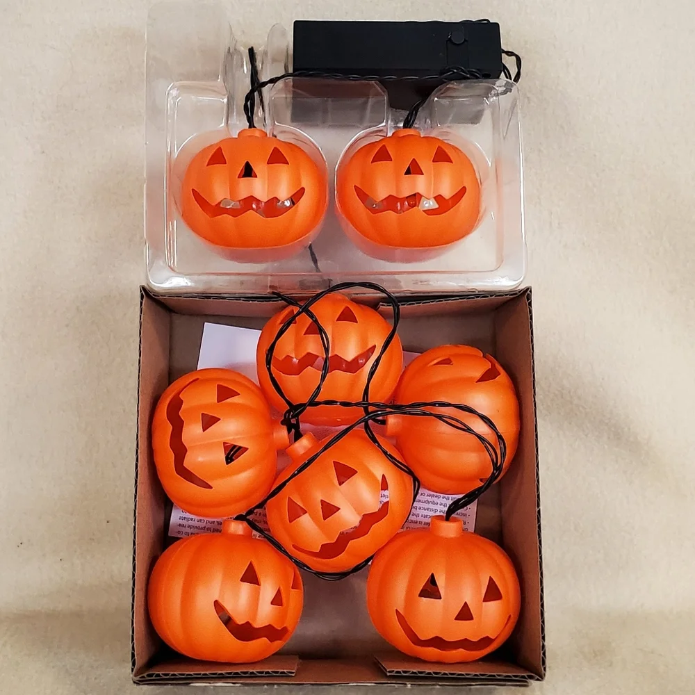 String of 8 halloween battery operated led orange blinking pumpkin lights